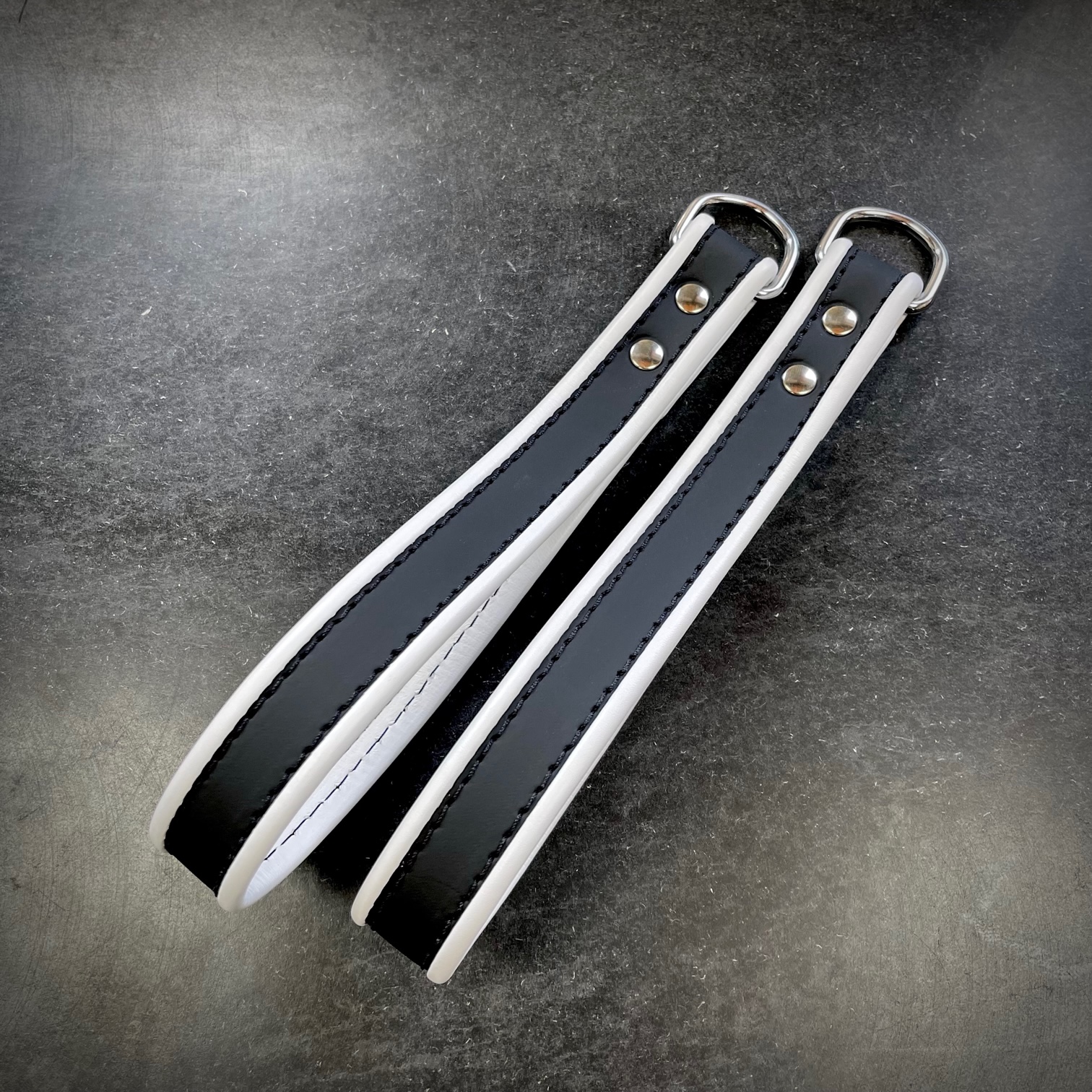 Steeltoys wrist loops black white